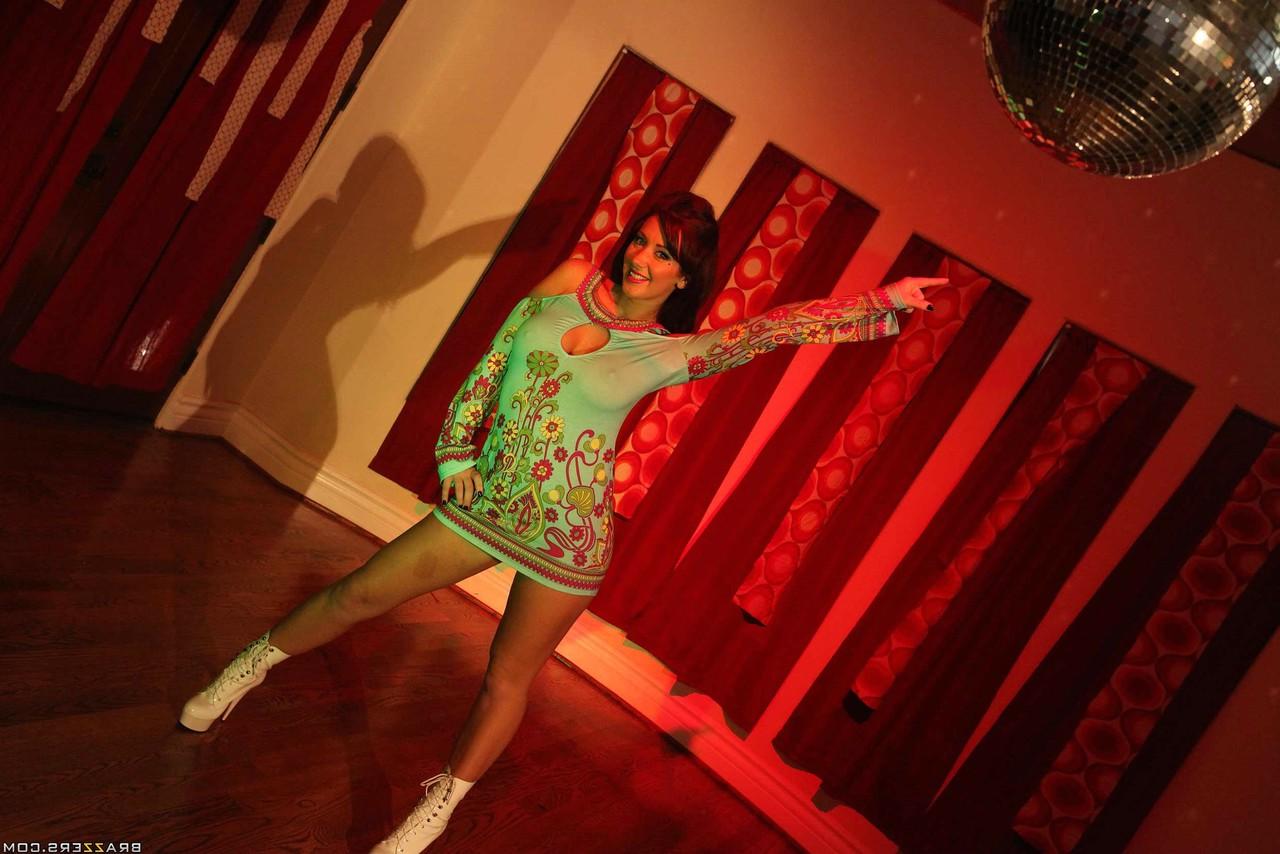17P Lovely brunette MILF with big tits Jayden Jaymes has fun at 70's party