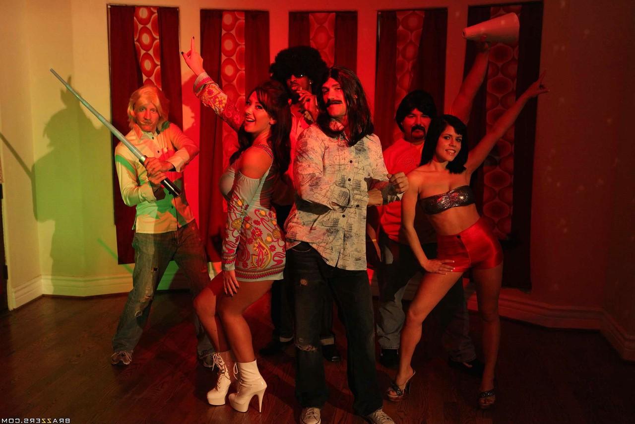 17P Lovely brunette MILF with big tits Jayden Jaymes has fun at 70's party