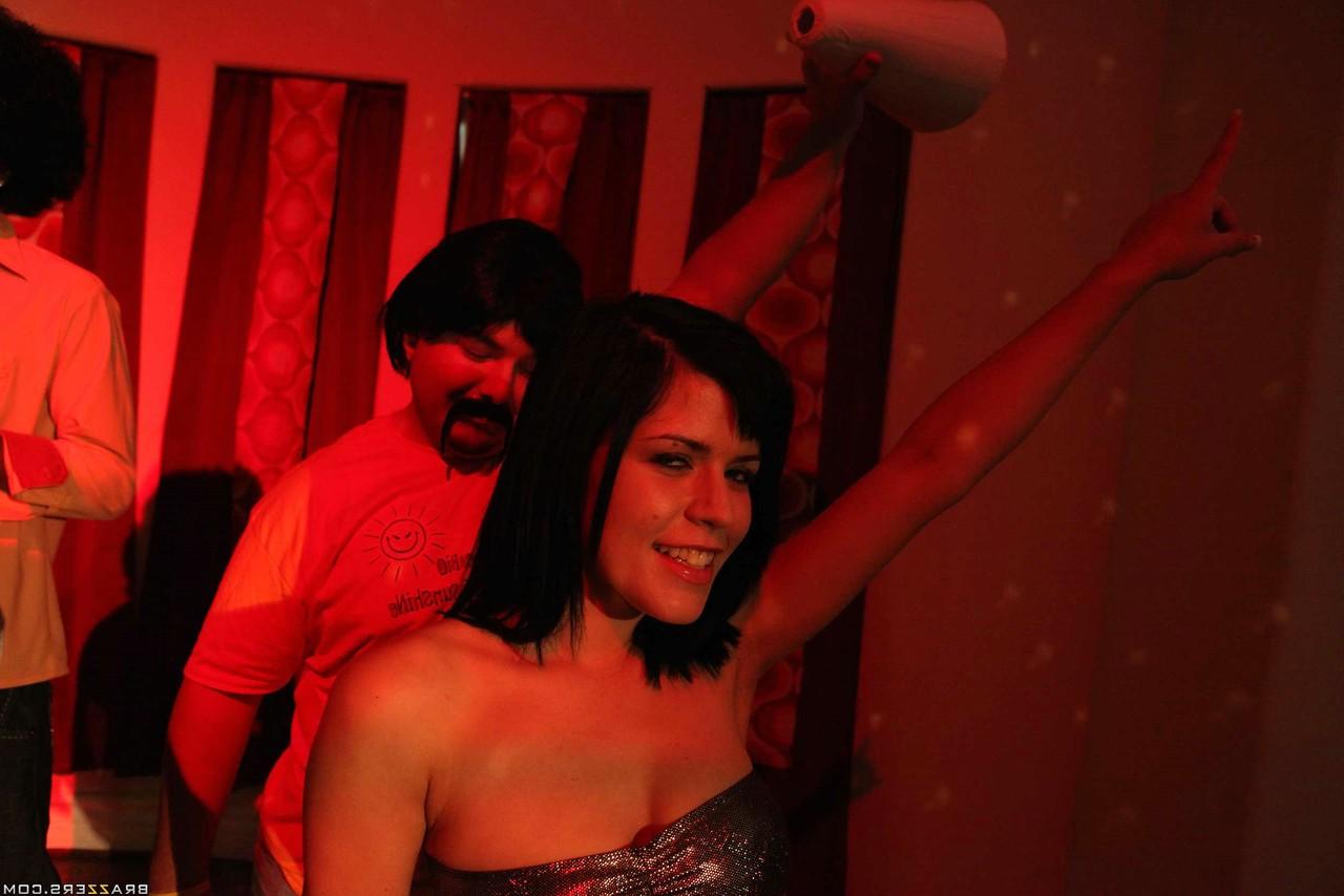 17P Lovely brunette MILF with big tits Jayden Jaymes has fun at 70's party