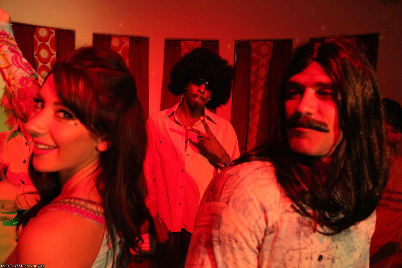 17P Lovely brunette MILF with big tits Jayden Jaymes has fun at 70's party
