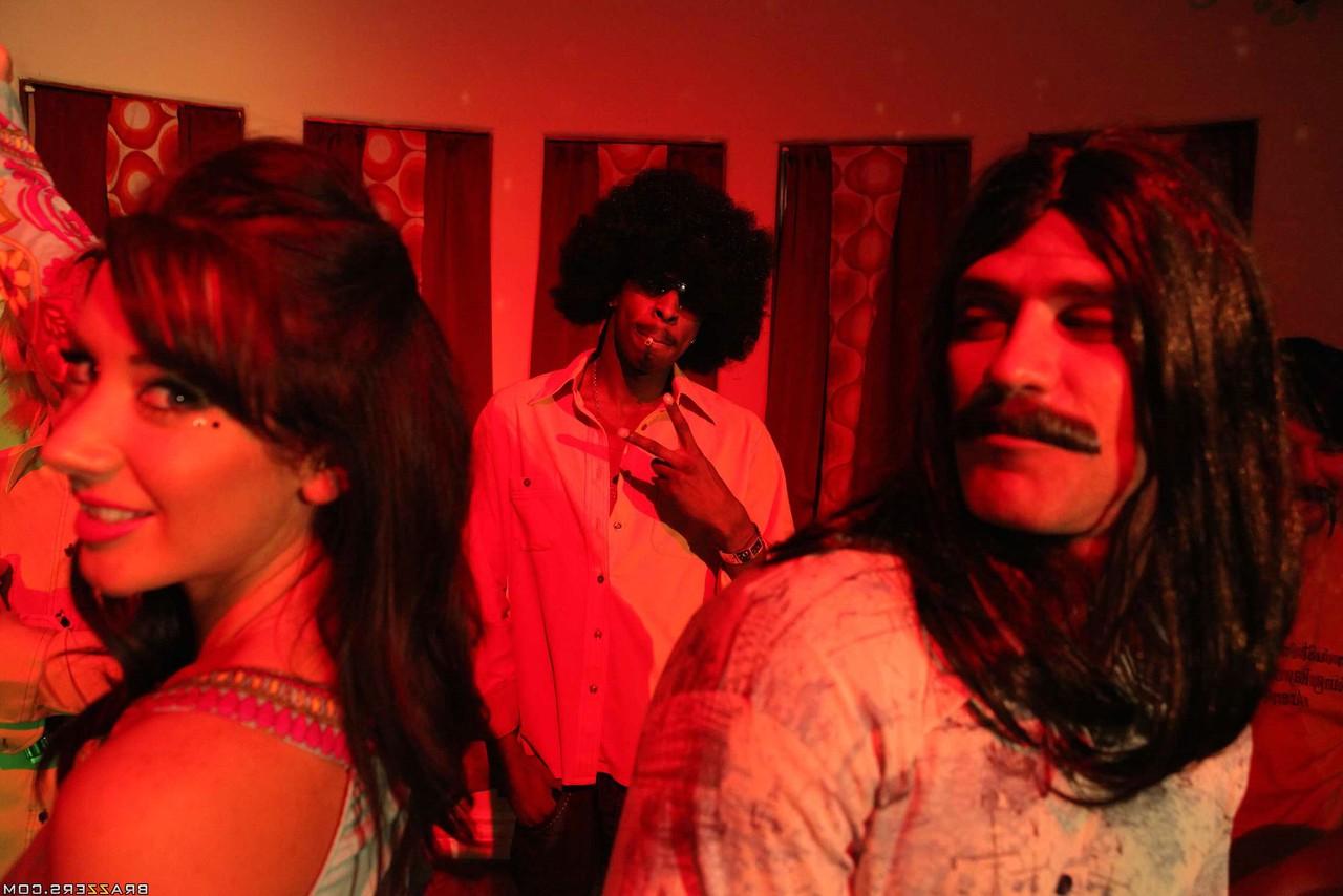 17P Lovely brunette MILF with big tits Jayden Jaymes has fun at 70's party