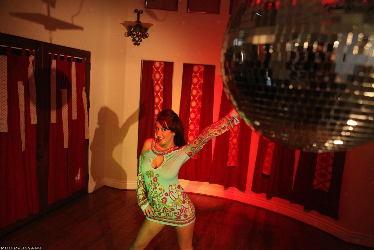 17P Lovely brunette MILF with big tits Jayden Jaymes has fun at 70's party