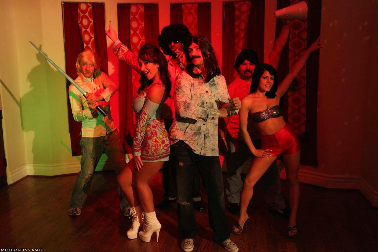 17P Lovely brunette MILF with big tits Jayden Jaymes has fun at 70's party