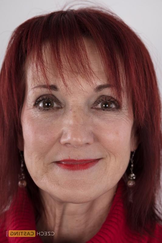 17P Older redhead Irena stands naked after undressing for her nude debut