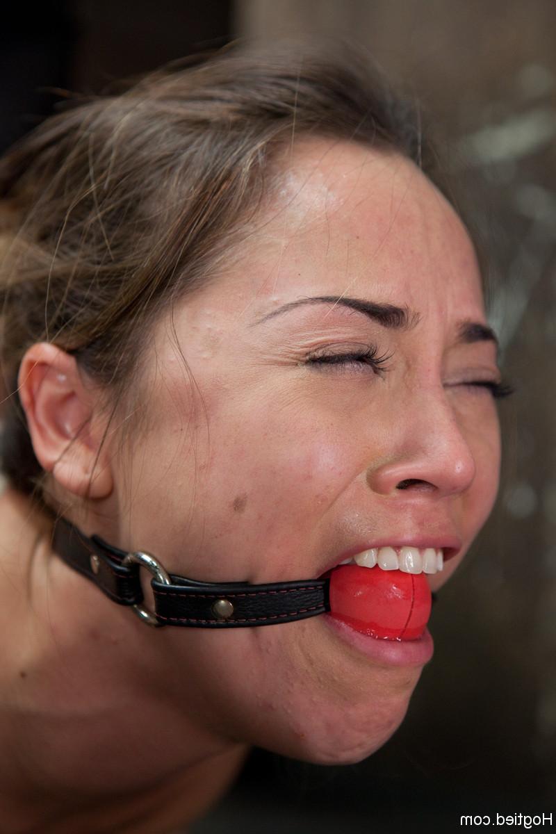 20P Submissive babe Kristina Rose gets hogtied & shocked by a dom in a basement