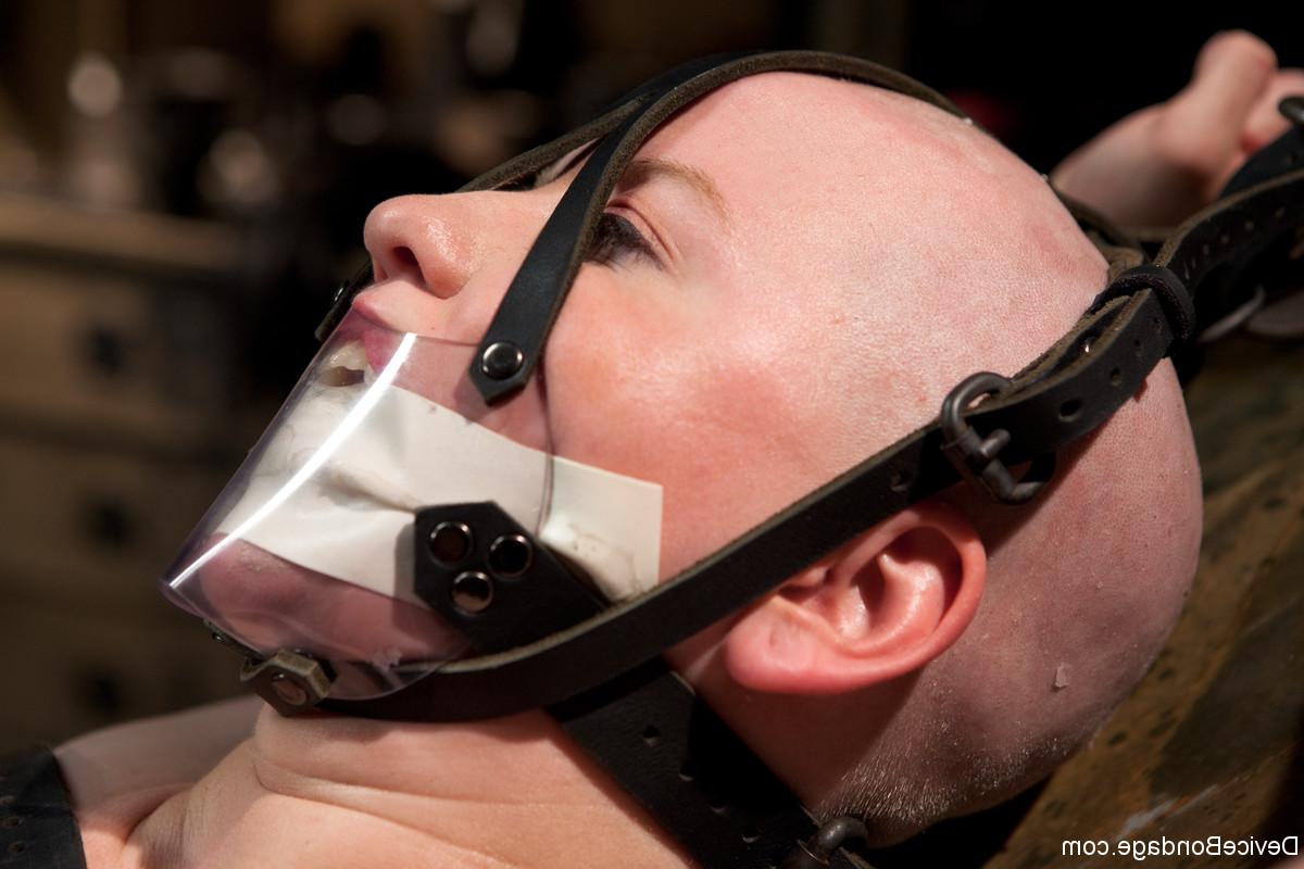 17P Bald Alani Pi is shackled while her master puts clamps on her body
