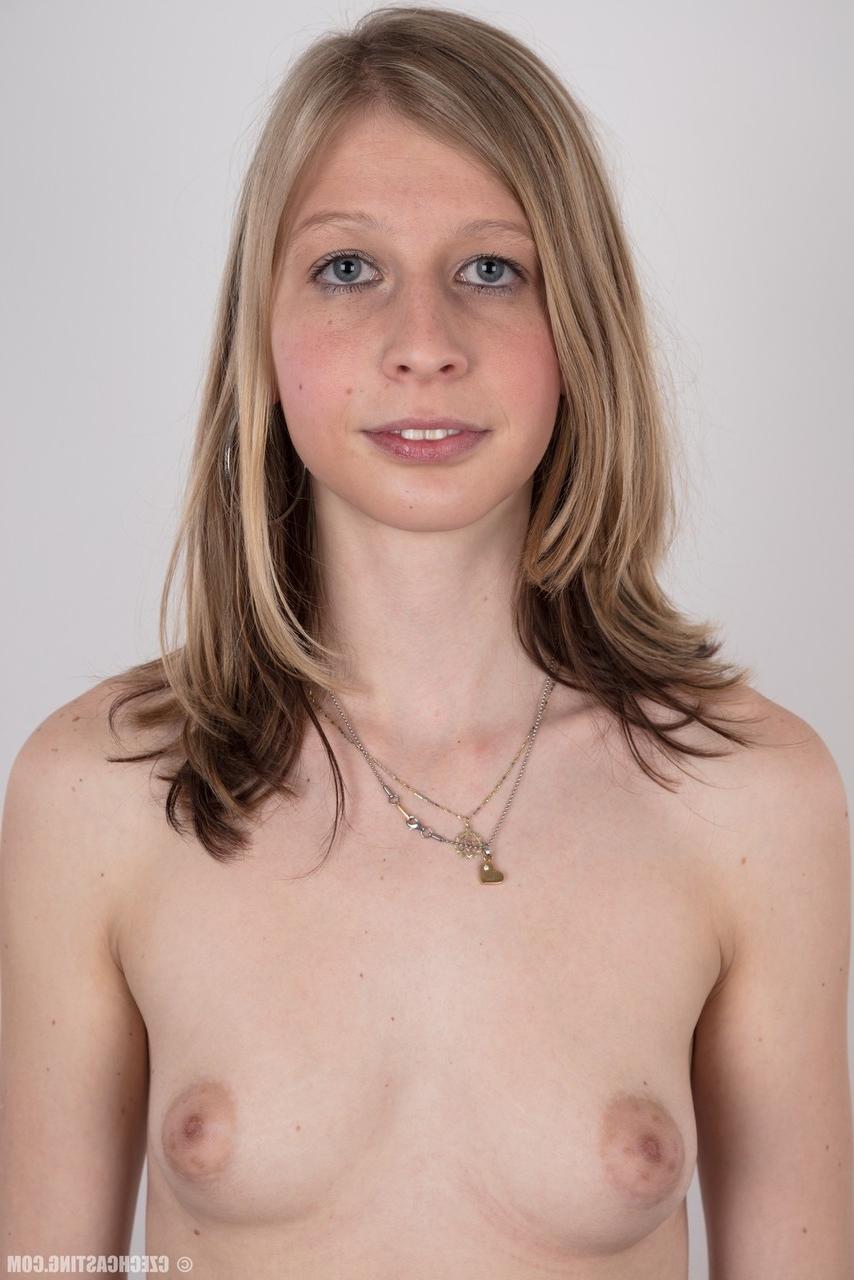 20P Blonde teenager Daniela undresses to try her luck at nude modeling
