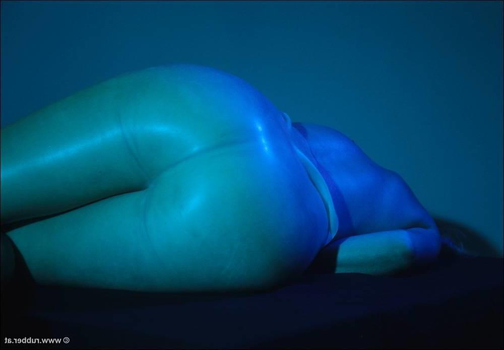 16P Natural blonde finds herself restrained to a glass table in latex clothing