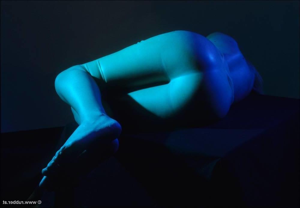 16P Natural blonde finds herself restrained to a glass table in latex clothing