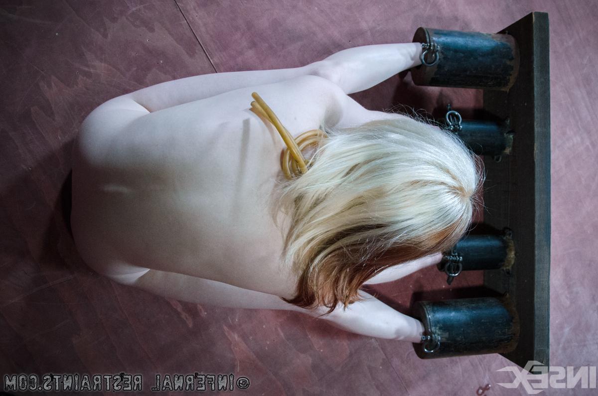 14P Middle-aged blonde April Rain is restrained in a dungeon while bare naked