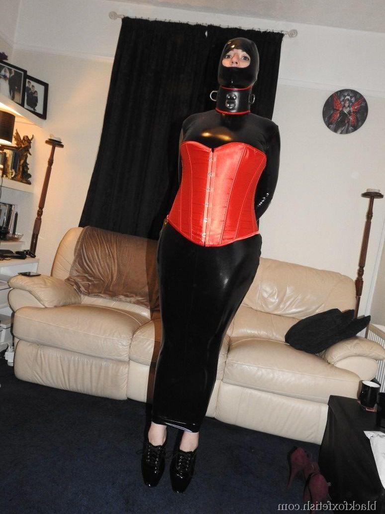 16P Caucasian girl is covered from the top of her head down to her ankles in latex