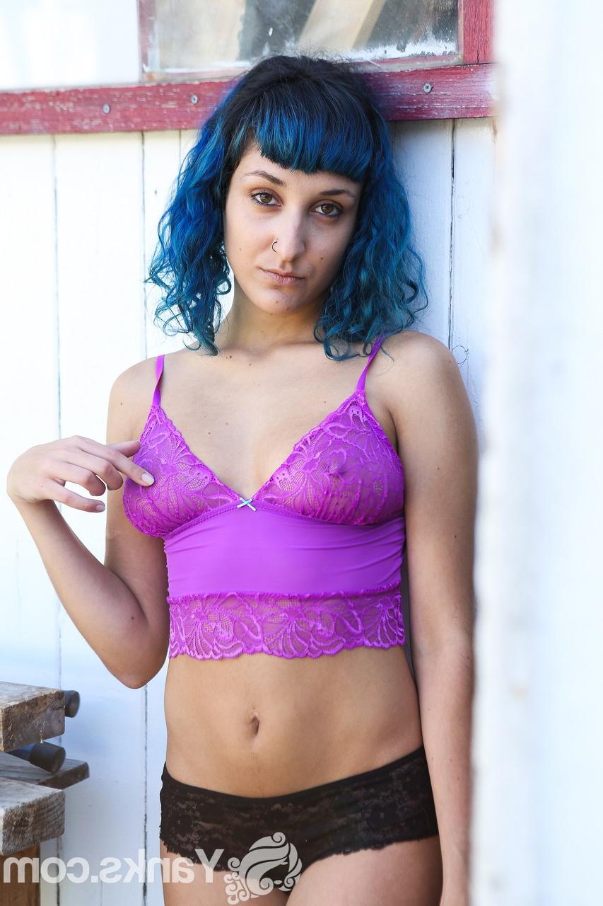 17P Blue haired vixen Jay Elle flaunts her hairy armpits and pussy while stripping