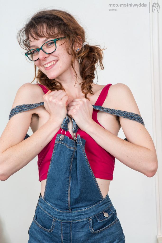 16P Skinny nerd Victoria J uncovers her tiny tits before fingering her beaver