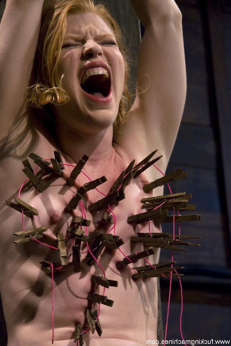 20P Hot redhead Madison Young gets her body pinched with clothespins while tied up