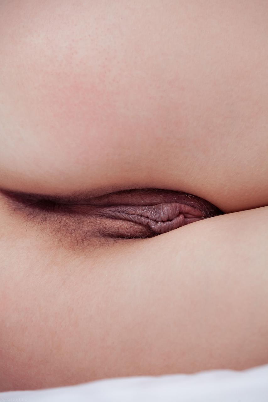 20P Pretty teen Iva stripping and exposing her hairy crotch and her big clit