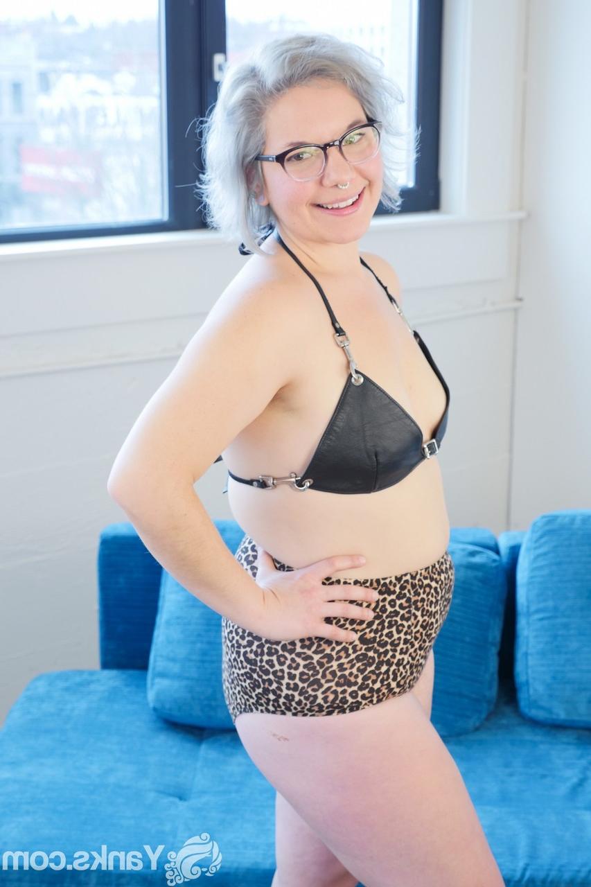 17P Girl with glasses Clementine strips and masturbates in heels only