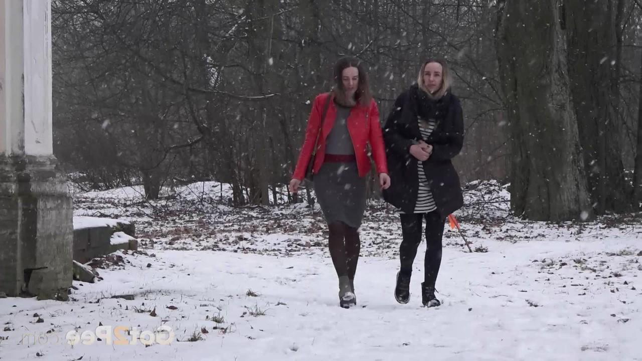15P Katya and her girlfriend pee on the snow-covered steps of a building