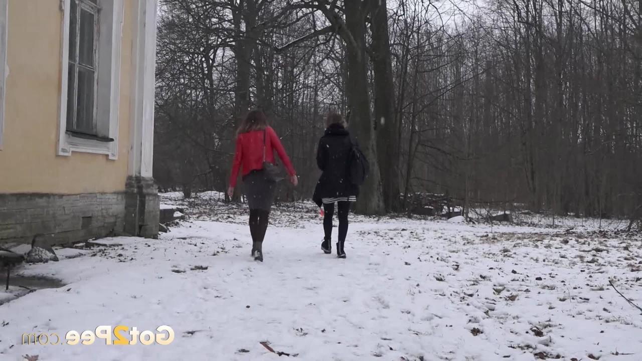 15P Katya and her girlfriend pee on the snow-covered steps of a building