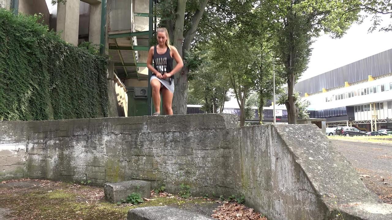 15P Solo girl Naomi Bennet takes a piss in public while wearing a miniskirt