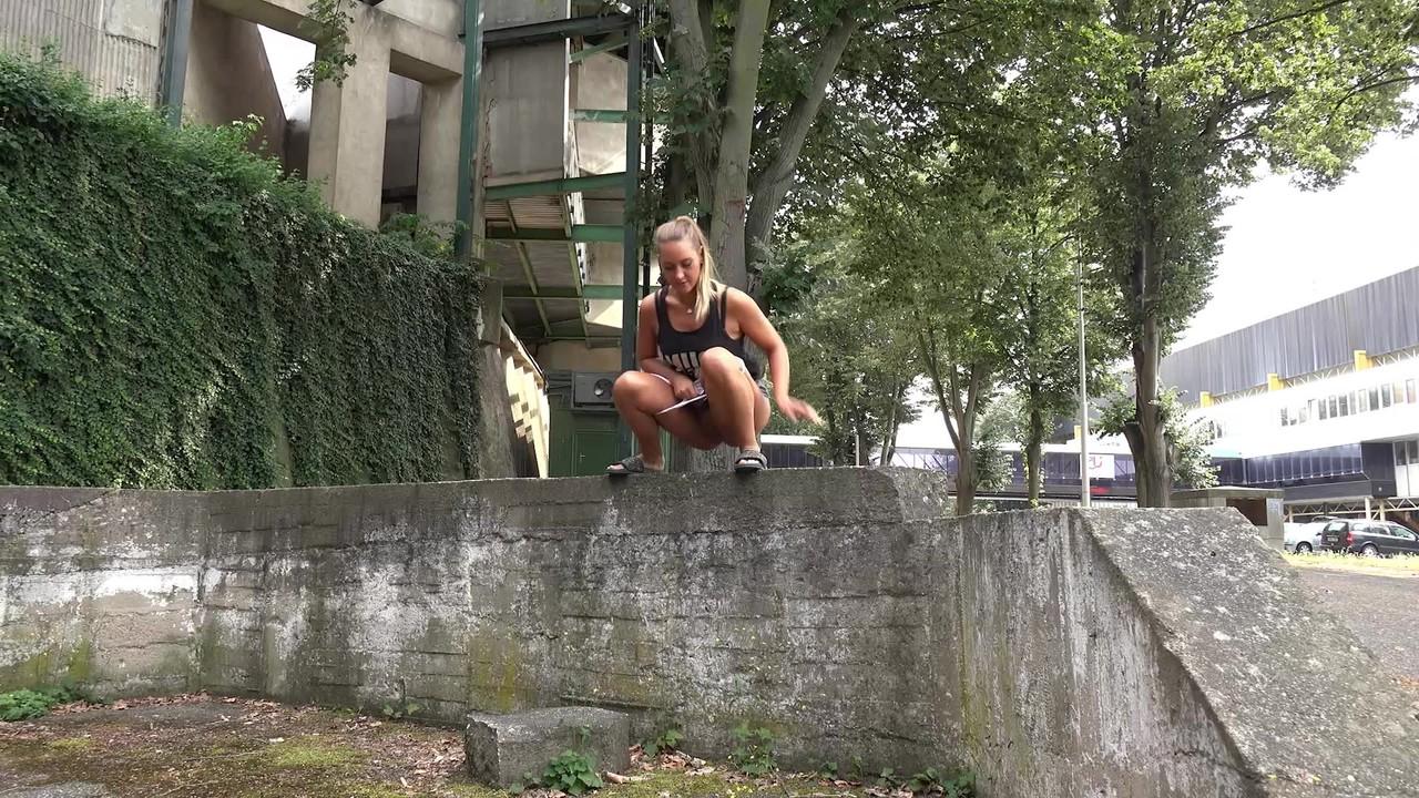15P Solo girl Naomi Bennet takes a piss in public while wearing a miniskirt