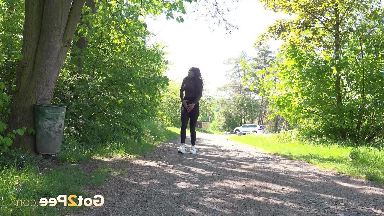 15P Nice girl Barbe gets caught with her leggings down while taking a pee