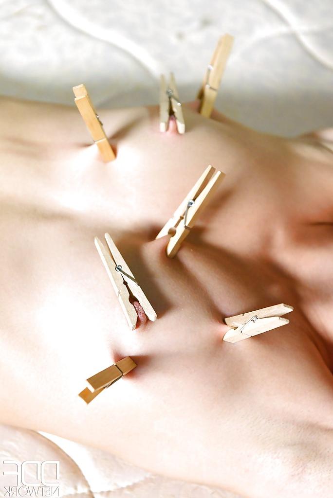 16P Skinny redhead BDSM model Susana Melo has clothespin attached to tits
