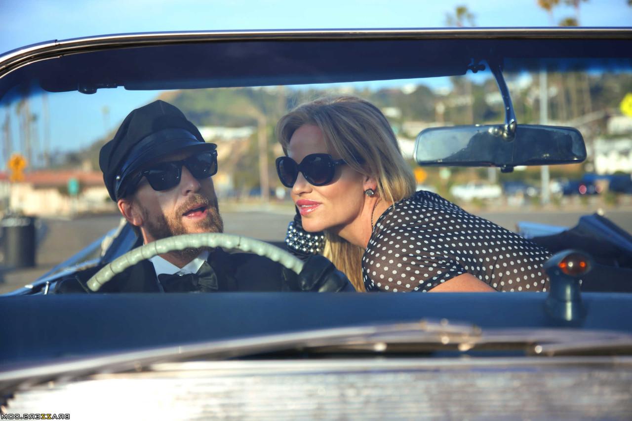18P MILF Kelly Madison exposes her big tits & kisses her driver on the highway