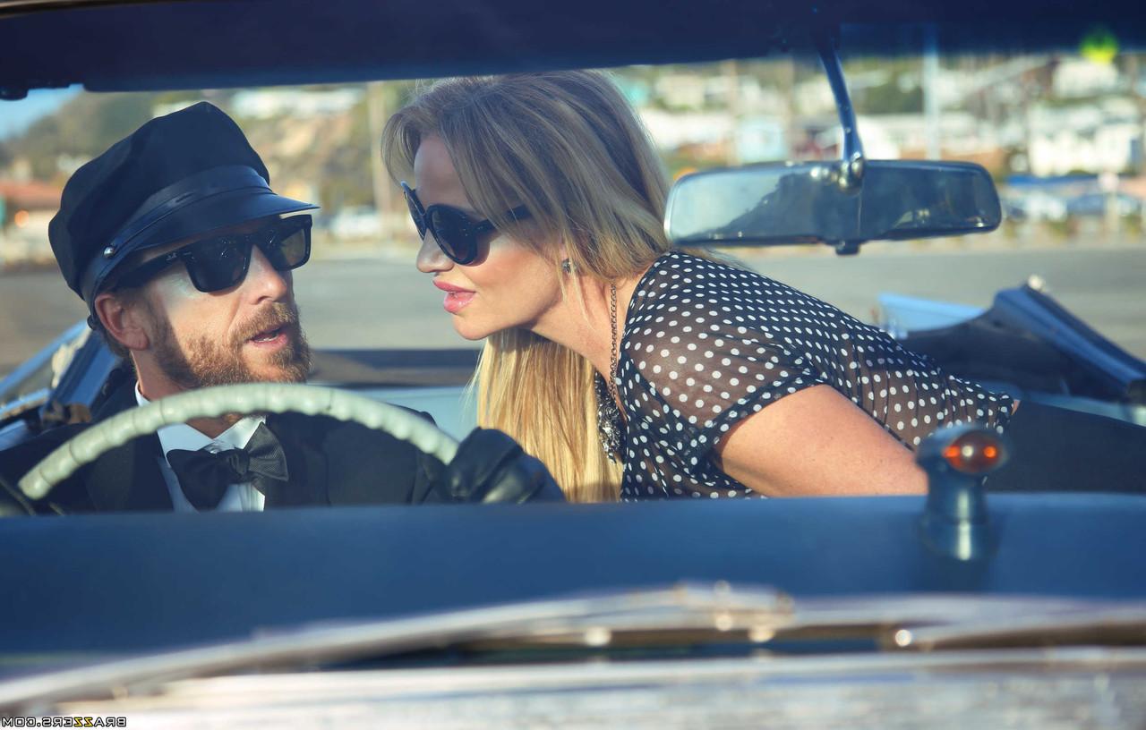 18P MILF Kelly Madison exposes her big tits & kisses her driver on the highway