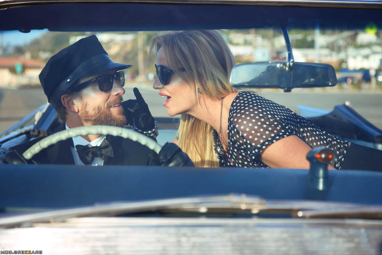 18P MILF Kelly Madison exposes her big tits & kisses her driver on the highway