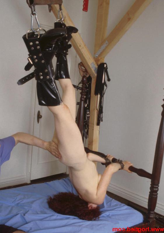 20P Redheaded slave Lyssa gets whipped and toyed while tied to a bed