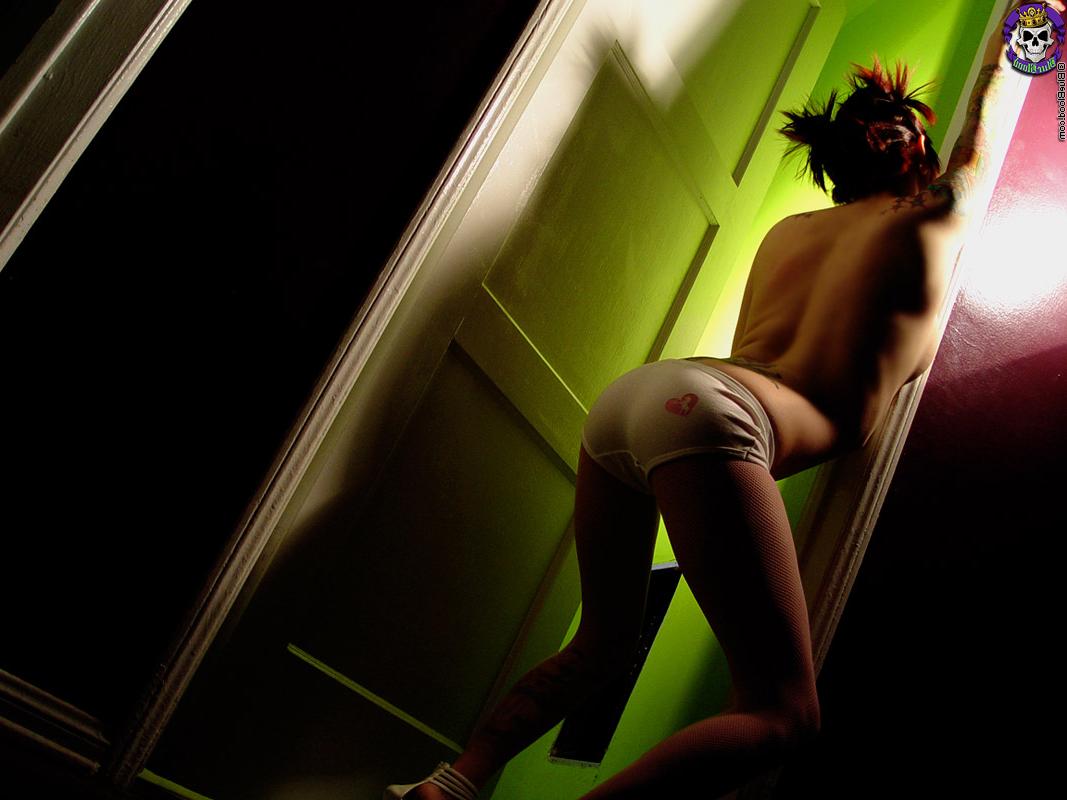 16P Tattooed redhead Erica uncovers her great tits during solo action
