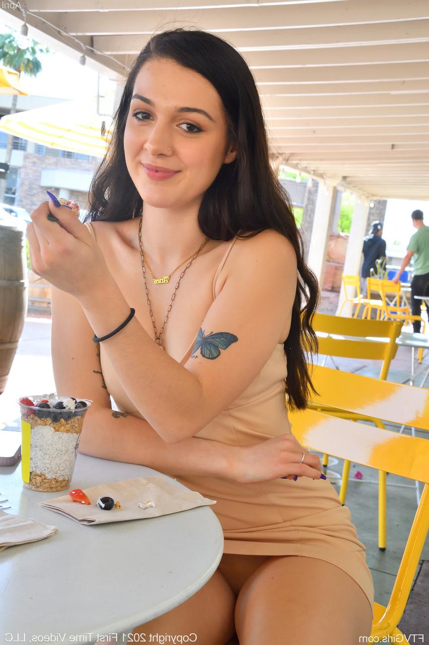 20P Glamour babe April flashes her tiny tits & her shaved pussy in public