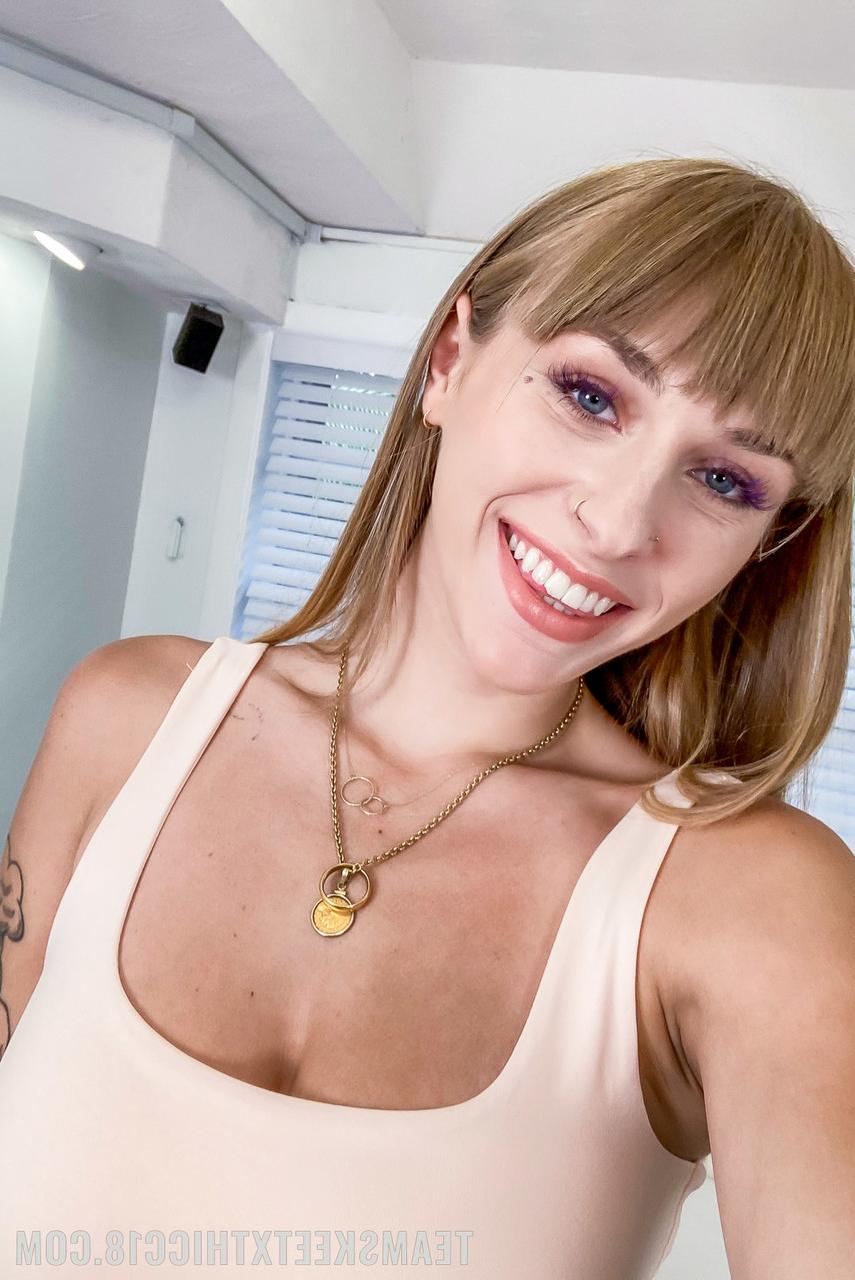 20P American babe Angel Youngs strips & exposes her big boobs and booty
