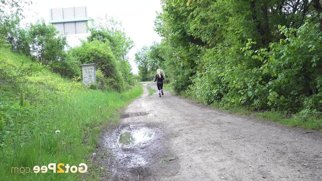 15P Blonde girl Victoria Pure squats for a piss on a country lane