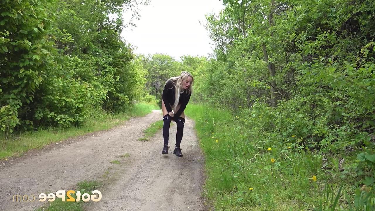 15P Blonde girl Victoria Pure squats for a piss on a country lane