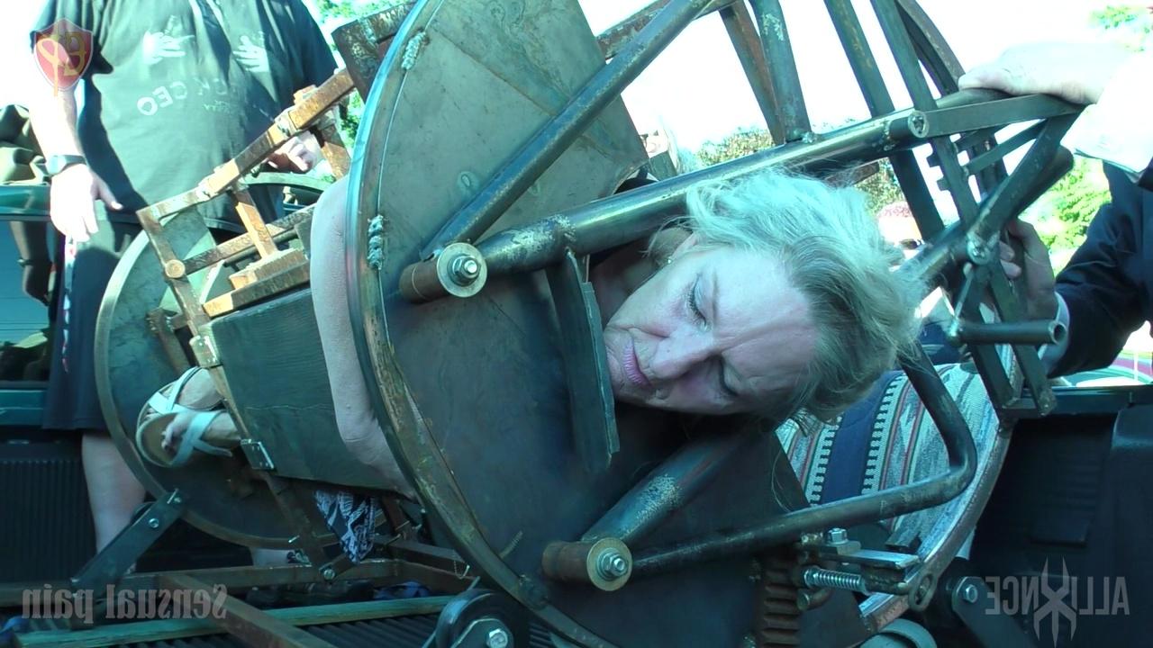 14P Female slave Mary Ellen is restrained during a public performance