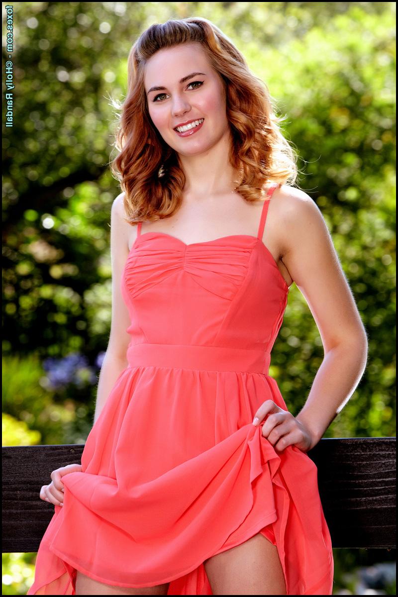 15P Pretty redhead Jonni Hennessy sets her great body free of a pretty dress