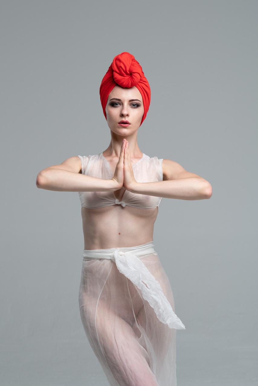 20P Beautiful babe does a sensual dance while wearing a see-through outfit