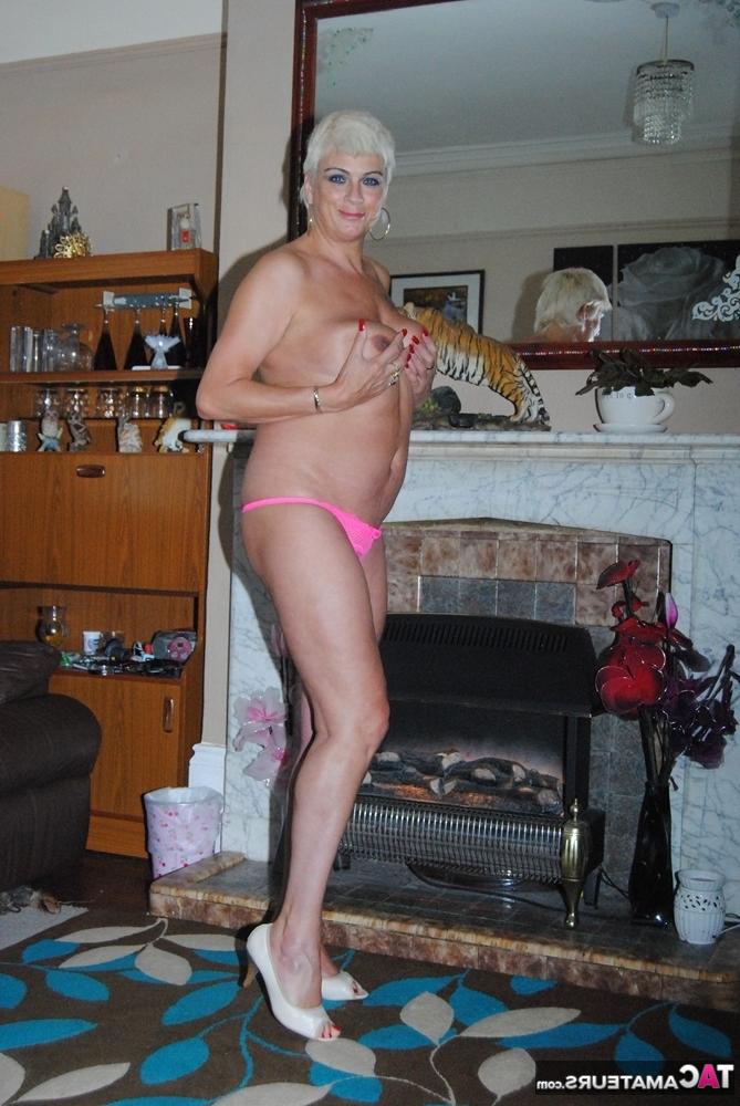20P Middle-aged lady Dimonty sports short platinum blonde hair while nude in shoes