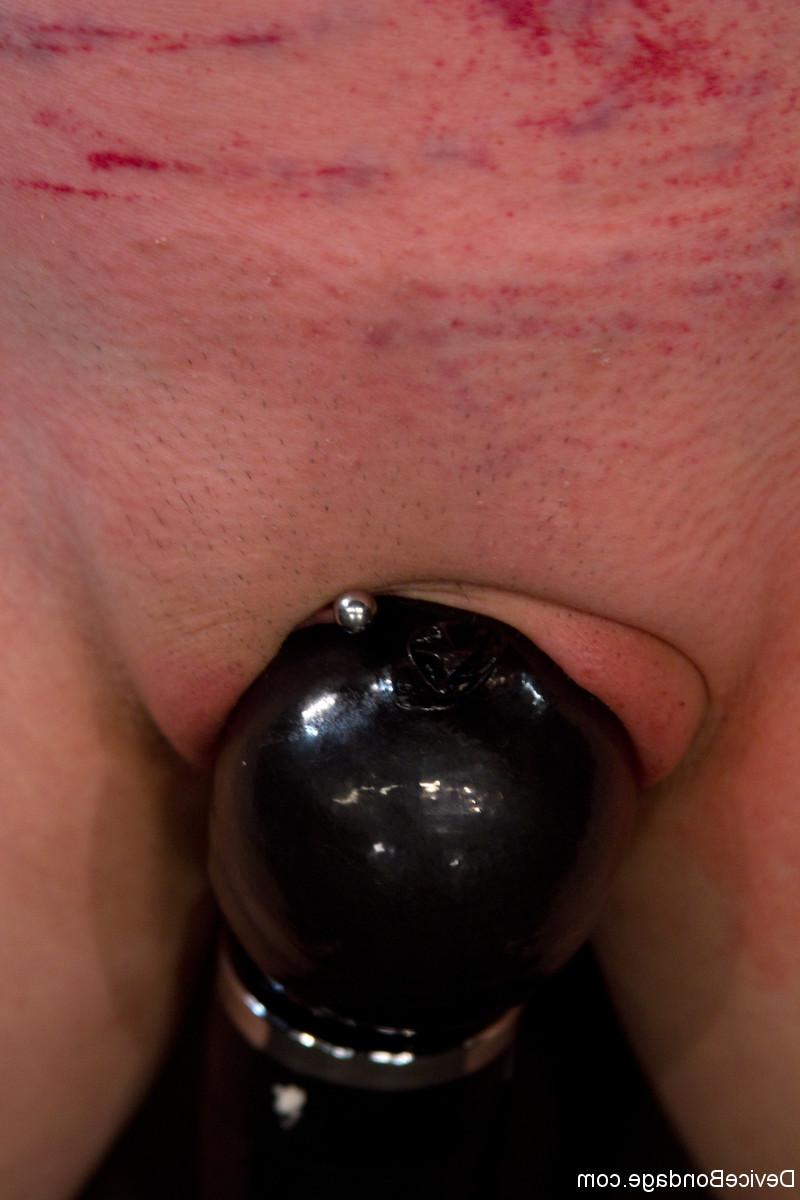 20P Masked slave girl Sloane Soleil gets toyed while standing in metal bondage
