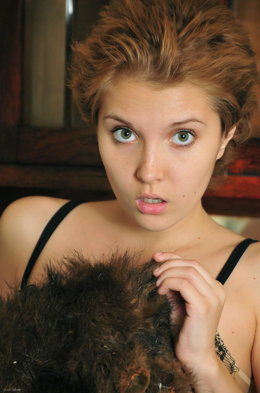17P Solo girlHelen C slips off her sheer lingerie with her dog at her side