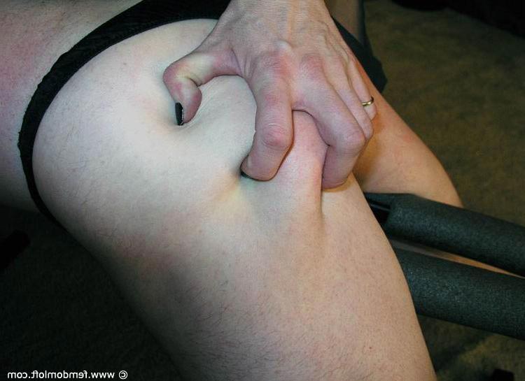 15P Sexy redhead flogs and smacks around a collared male slave in a dungeon