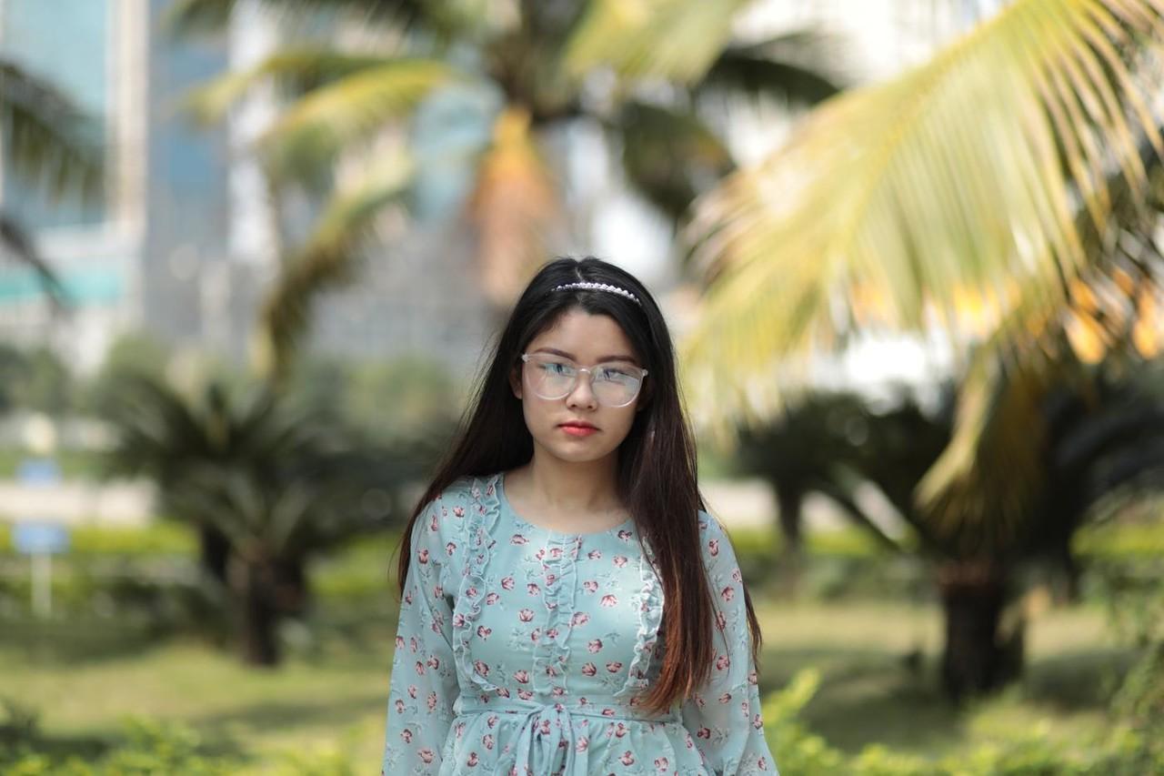 20P Dark-haired Asian babe Natalia posing in her summer dress in public