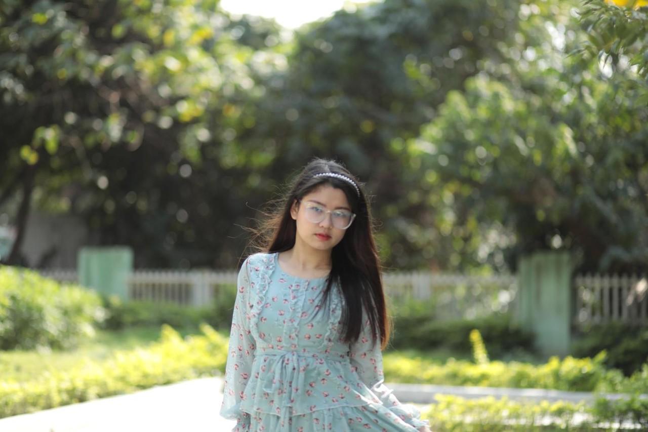 20P Dark-haired Asian babe Natalia posing in her summer dress in public