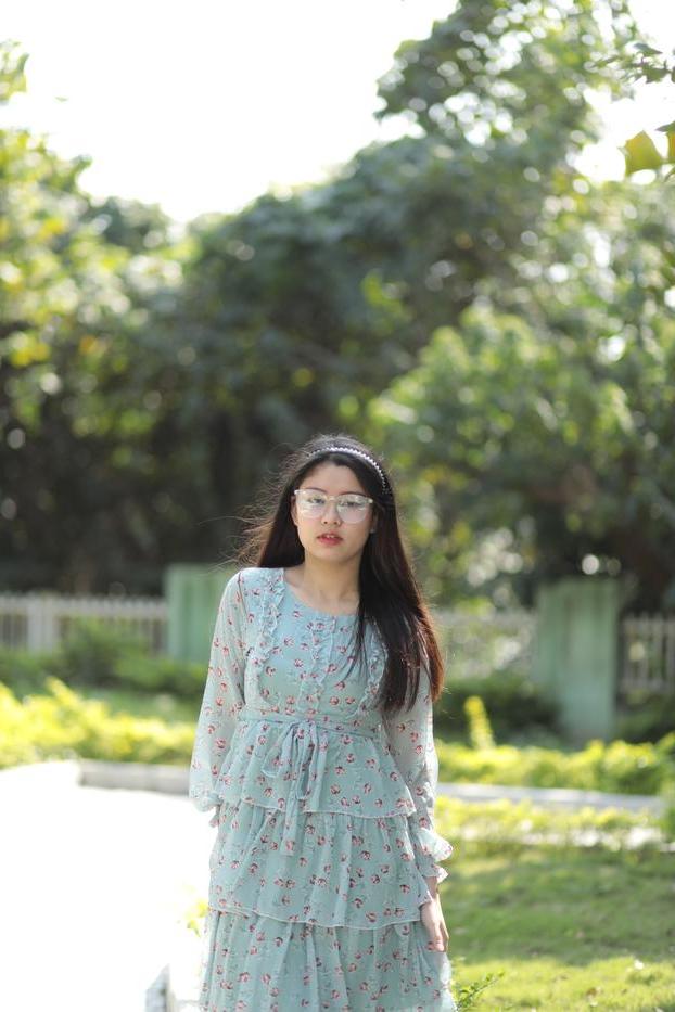 20P Dark-haired Asian babe Natalia posing in her summer dress in public