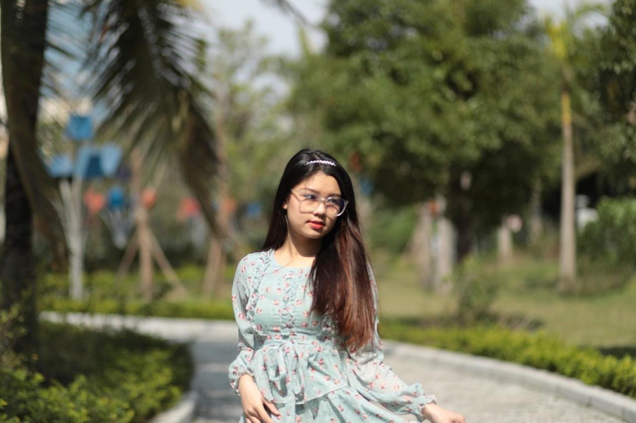 20P Dark-haired Asian babe Natalia posing in her summer dress in public