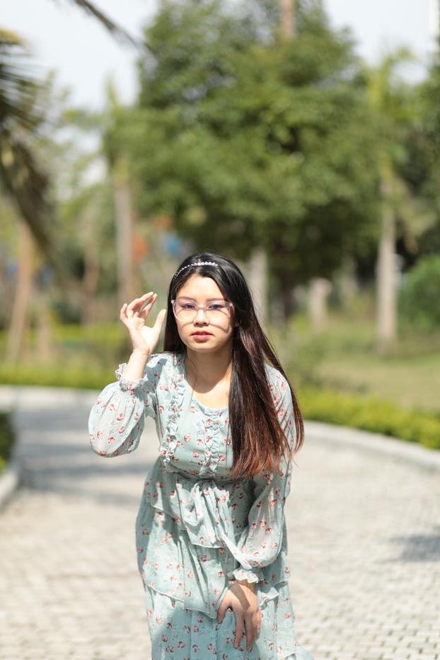 20P Dark-haired Asian babe Natalia posing in her summer dress in public