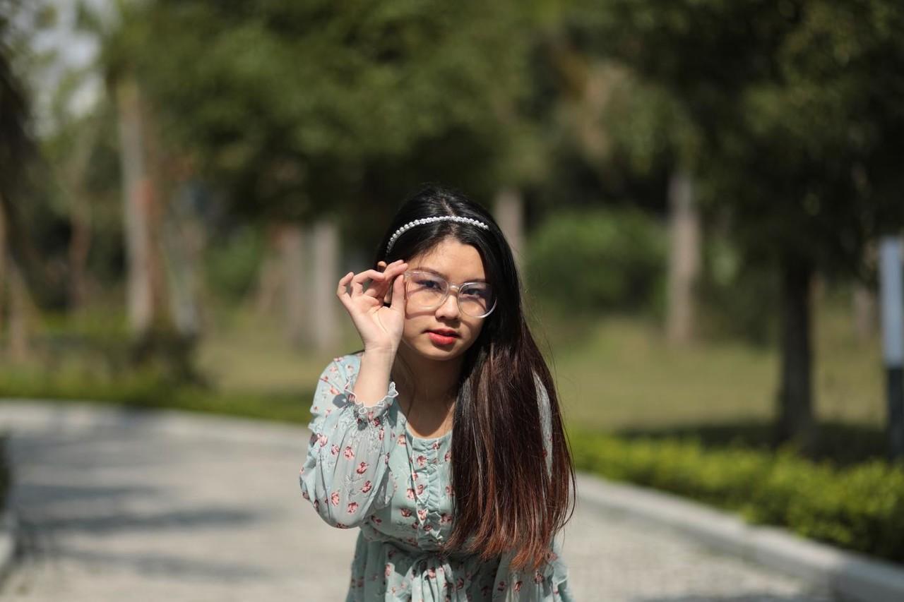 20P Dark-haired Asian babe Natalia posing in her summer dress in public