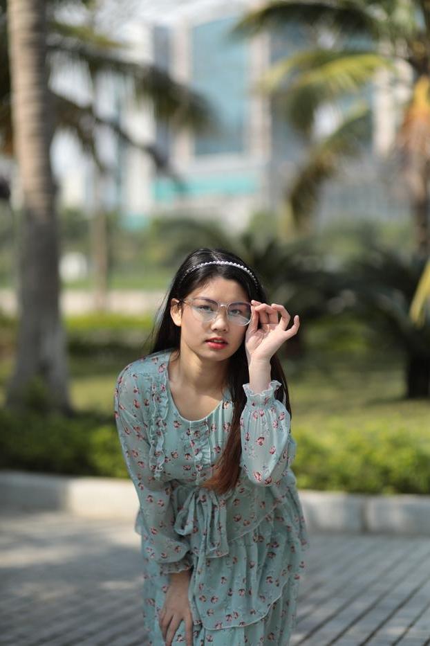 20P Dark-haired Asian babe Natalia posing in her summer dress in public