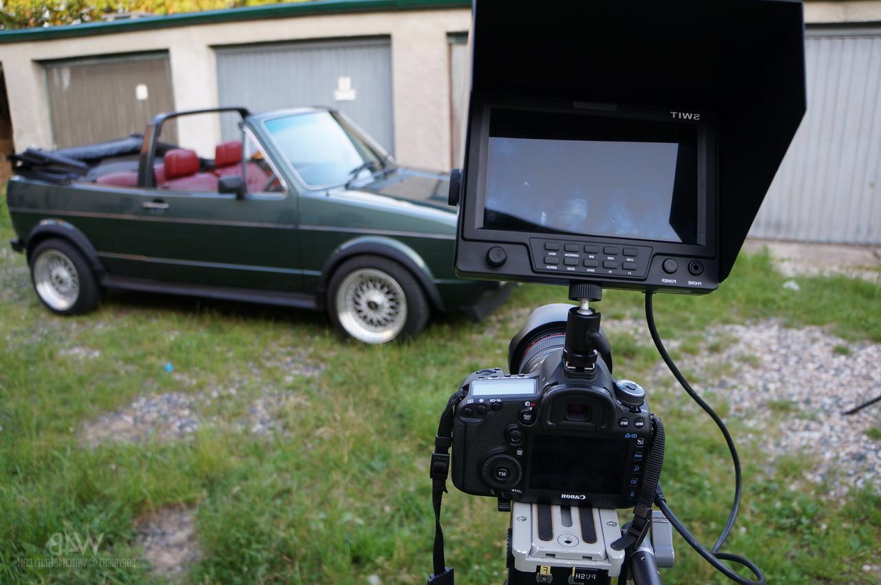 20P Glamorous Czech Connie Carter showing her big tits & ass in a convertible